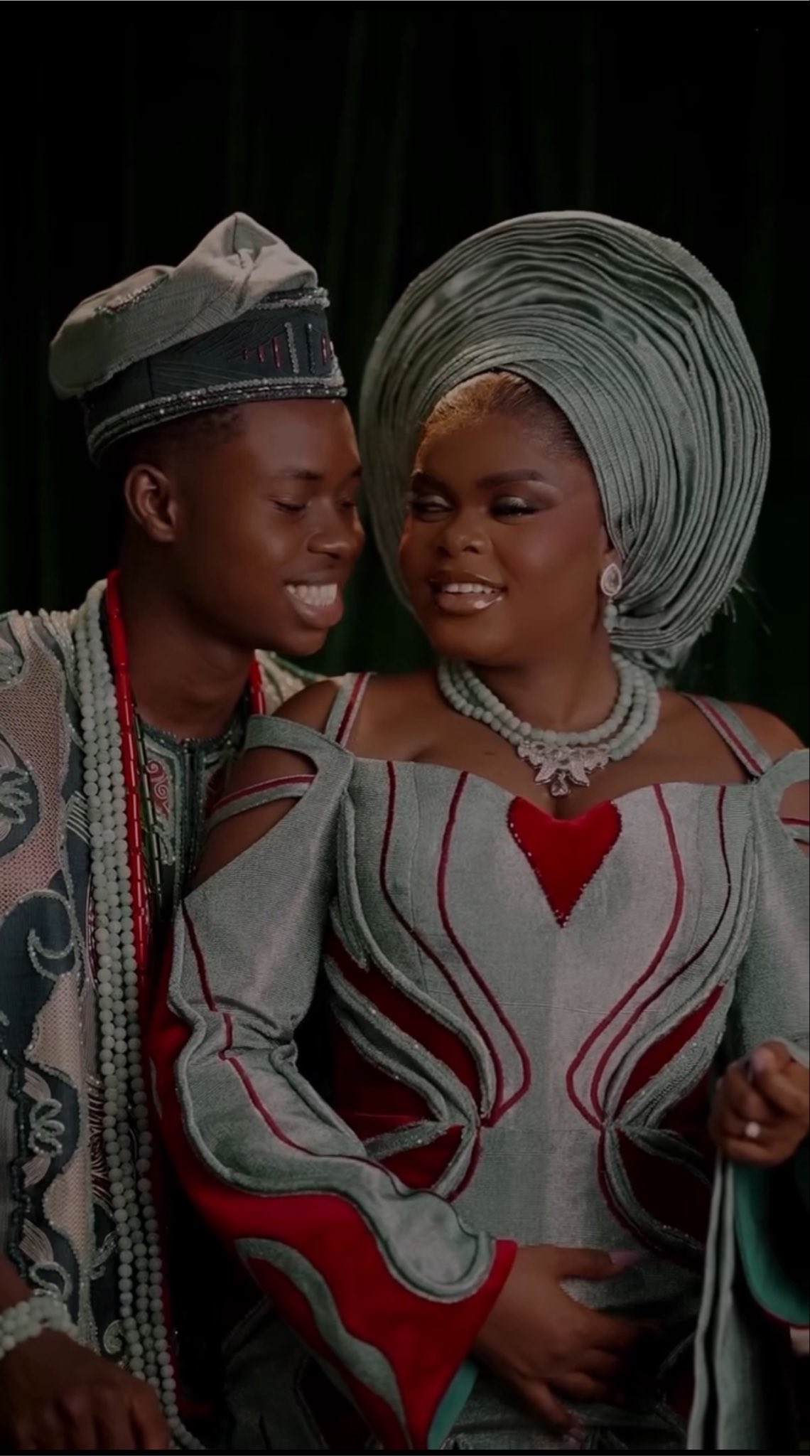 TikTok creators Peller and Jarvis pose in matching traditional Yoruba wedding attire during their wedding ceremony in Lagos, Nigeria.