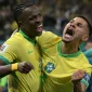 Brazil stars Vinicius Junior and Bruno Guimaraes celebrate during an international football match amid Arsenal transfer speculation.