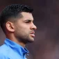 Cristian Romero pictured in a Tottenham training jacket.