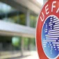 UEFA logo displayed outside the European football governing body's headquarters following its statement welcoming FIFA's withdrawal of plans to sell a stake in the World Cup.